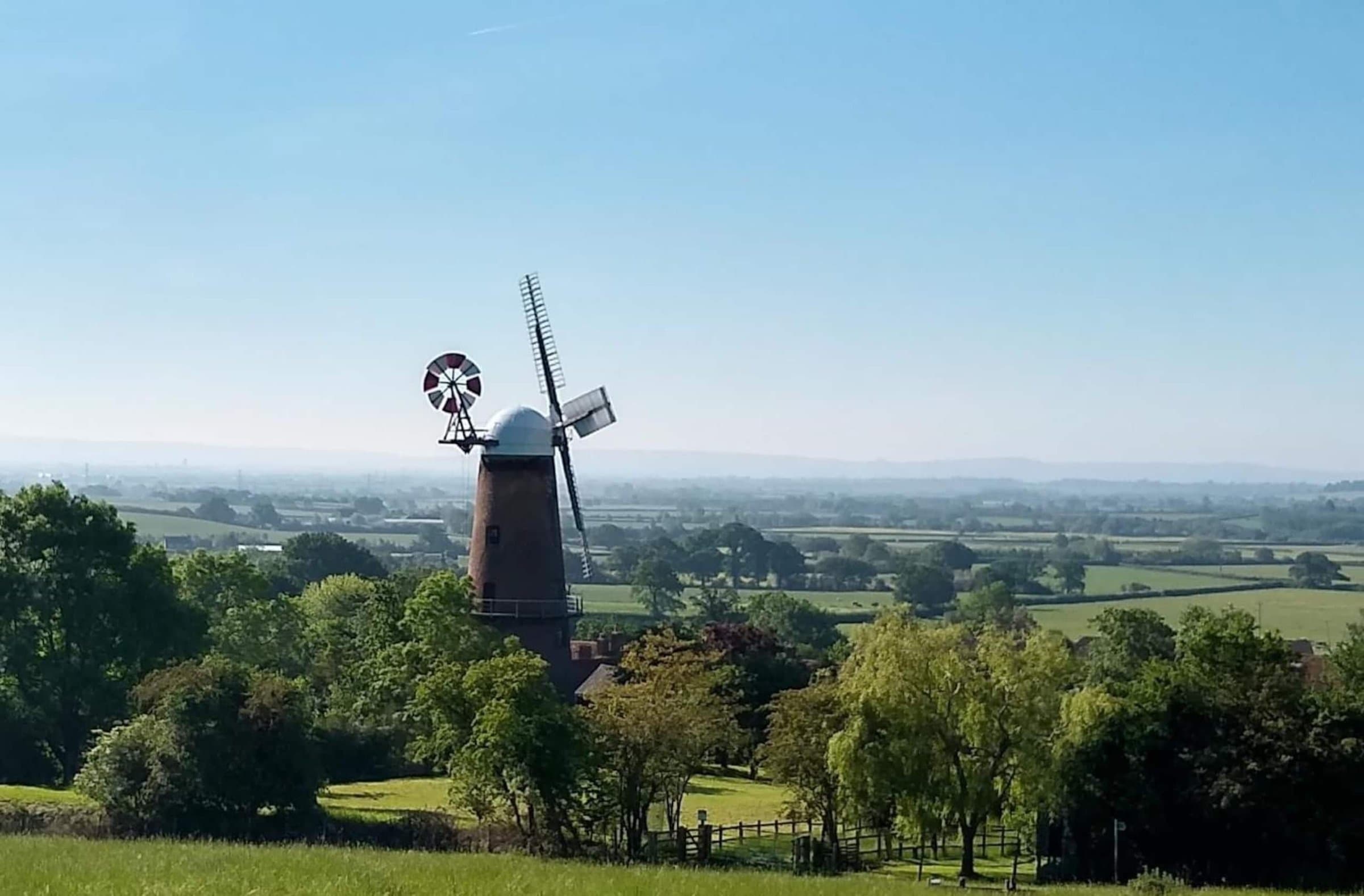 Quainton's working windmill on the hill, with the Vale of Aylesbury spread out behind it